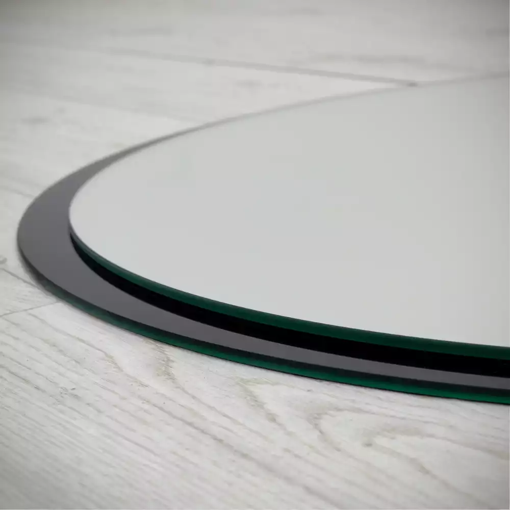 Ronde spiegel zwart muur in zwart frame